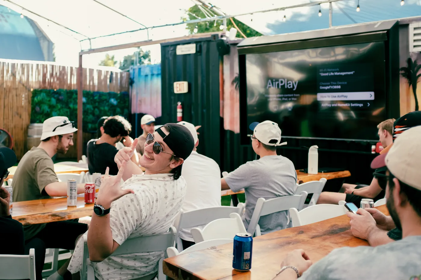 Taiv teammates hanging out on a patio
