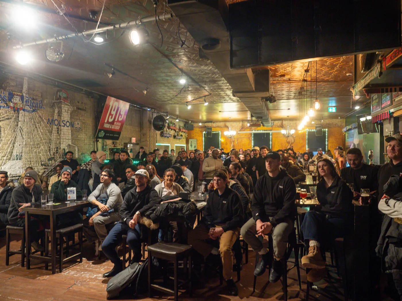 A packed bar crowd at a Taiv watch party